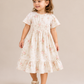 Girls White Floral Smocked Dress | Cotton Rose Print Party Frock with Ruffle Hem (2–8 Years)